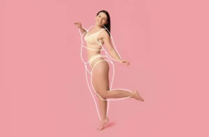 Happy woman showing before and after outline of body transformation from weight loss